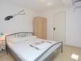 Bedroom Duće, Bedroom in the apartment, air condition available and WiFi.