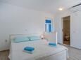 Mali Lošinj, Chambre dans l’hébergement en type studio-apartment, climatisation disponible, animaux acceptés et WiFi.