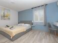 Bedroom 1 Makarska, Bedroom 1 in the apartment, air condition available and WiFi.