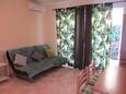 Obývací pokoj Pakoštane, Obývací pokoj v ubytování typu apartment, s klimatizací, domácí mazlíčci povoleni a WiFi.