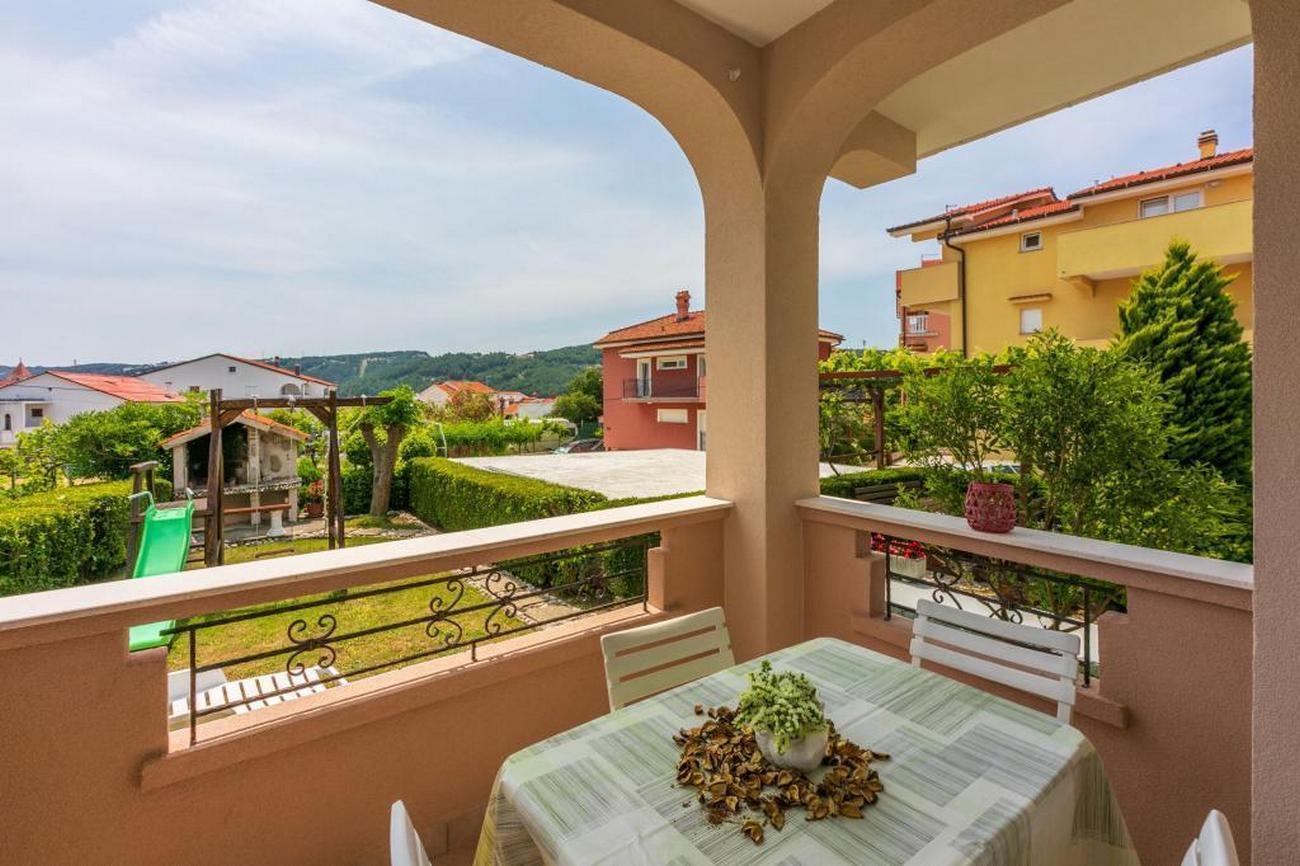 Two bedroom apartment with terrace Lopar, Rab (A-18388-a)