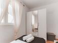 Molat, Ložnice 2 v ubytování typu apartment, domácí mazlíčci povoleni a WiFi.