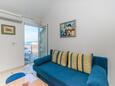 Living room Vir, Living room in the studio-apartment, air condition available, (pet friendly) and WiFi.