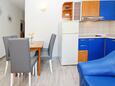 Jídelna Baška, Jídelna v ubytování typu apartment, domácí mazlíčci povoleni a WiFi.