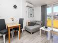 Obývací pokoj Baška, Obývací pokoj v ubytování typu apartment, s klimatizací, domácí mazlíčci povoleni a WiFi.