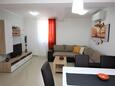 Obývací pokoj Baška, Obývací pokoj v ubytování typu apartment, s klimatizací a WiFi.