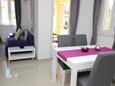 Obývací pokoj Baška, Obývací pokoj v ubytování typu apartment, s klimatizací a WiFi.