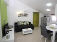 Obývací pokoj Baška, Obývací pokoj v ubytování typu apartment, s klimatizací a WiFi.