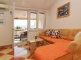 Living room Baška, Living room in the apartment, air condition available and WiFi.