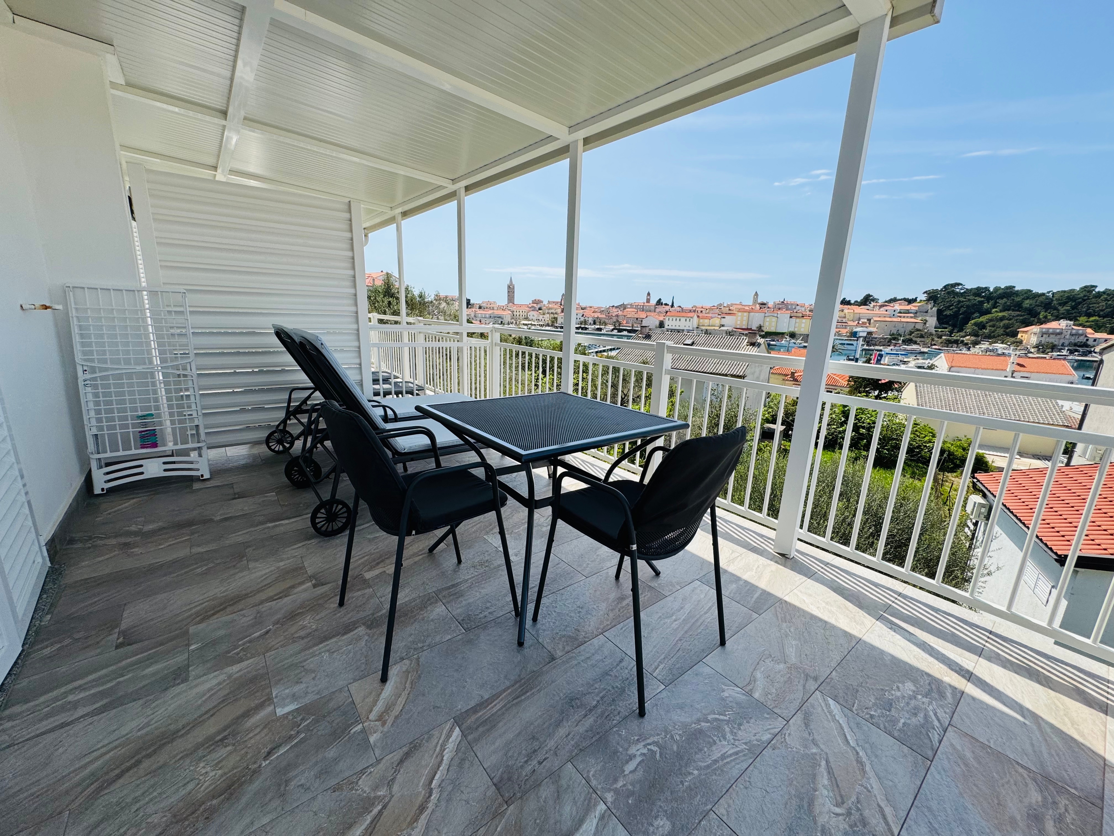 Room with terrace and sea view Rab (S-18786-c)