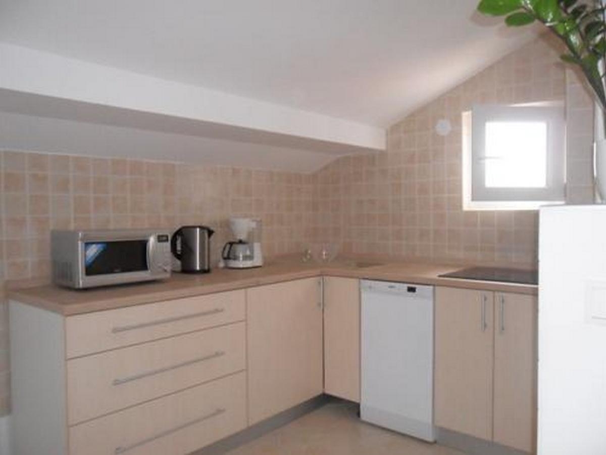 Two bedroom apartment with balcony and sea view Novi Vinodolski  A-d