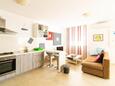 Obývací pokoj Sabunike, Obývací pokoj v ubytování typu apartment, s klimatizací a WiFi.