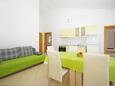 Dining room Krvavica, Dining room in the apartment, air condition available and WiFi.