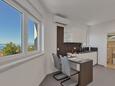Dining room Podgora, Dining room in the studio-apartment, air condition available and WiFi.