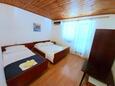 Ložnice 1 Vodice, Ložnice 1 v ubytování typu apartment, s klimatizací, domácí mazlíčci povoleni a WiFi.
