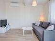 Obývací pokoj Pirovac, Obývací pokoj v ubytování typu apartment, s klimatizací a WiFi.