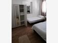 Žuljana, Bedroom in the apartment, air condition available and WiFi.