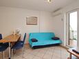 Obývací pokoj Baška, Obývací pokoj v ubytování typu apartment, s klimatizací a WiFi.