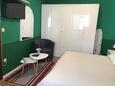 Primošten, Спальня в размещении типа studio-apartment, доступный кондиционер и WiFi.