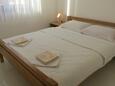 Ložnice Malinska, Ložnice v ubytování typu apartment, domácí mazlíčci povoleni a WiFi.