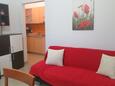 Obývací pokoj Malinska, Obývací pokoj v ubytování typu apartment, s klimatizací a WiFi.