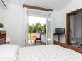 Malinska, Спальня в размещении типа studio-apartment, доступный кондиционер, Домашние животные допускаются и WiFi.