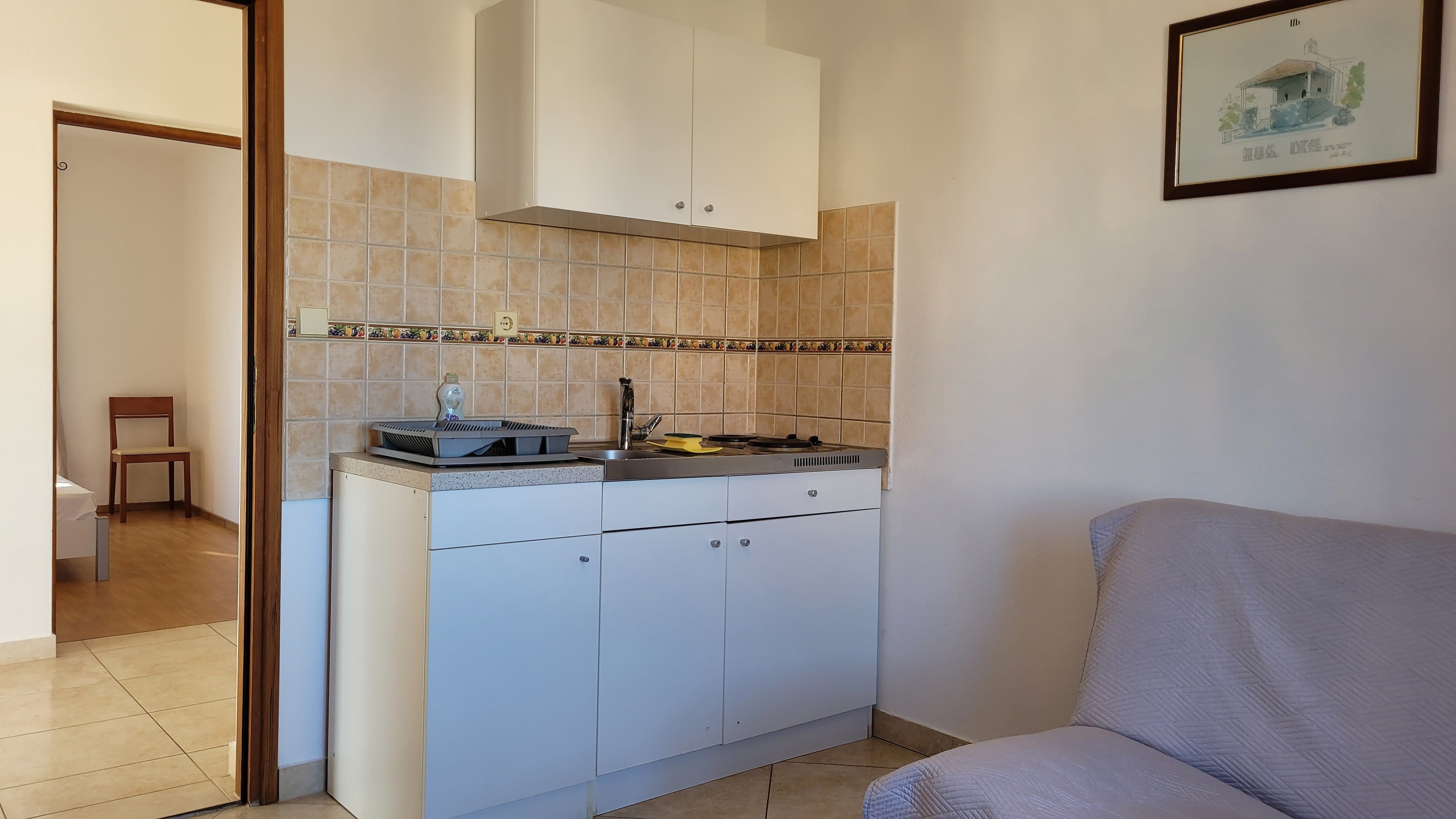 Jednosobni apartman s balkonom i pogledom na more Omišalj, Krk  A-b
