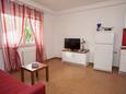 Obývací pokoj Baška, Obývací pokoj v ubytování typu apartment, s klimatizací a WiFi.