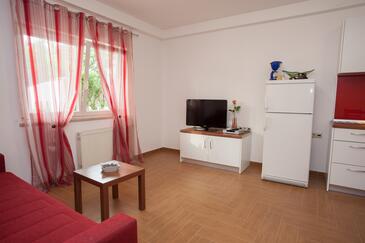 Baška, Living room in the apartment, air condition available and WiFi.