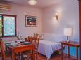Living room Lumbarda, Living room in the apartment, air condition available, (pet friendly) and WiFi.
