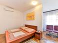 Schlafzimmer Nin, Schlafzimmer in folgender Unterkunftsart apartment, Klimaanlage vorhanden, Haustiere erlaubt und WiFi.