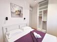 Спальня 1 Stobreč, Спальня 1 в размещении типа apartment, доступный кондиционер и WiFi.
