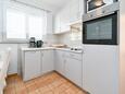 Supetarska Draga - Donja, Kitchen in the apartment, (pet friendly) and WiFi.