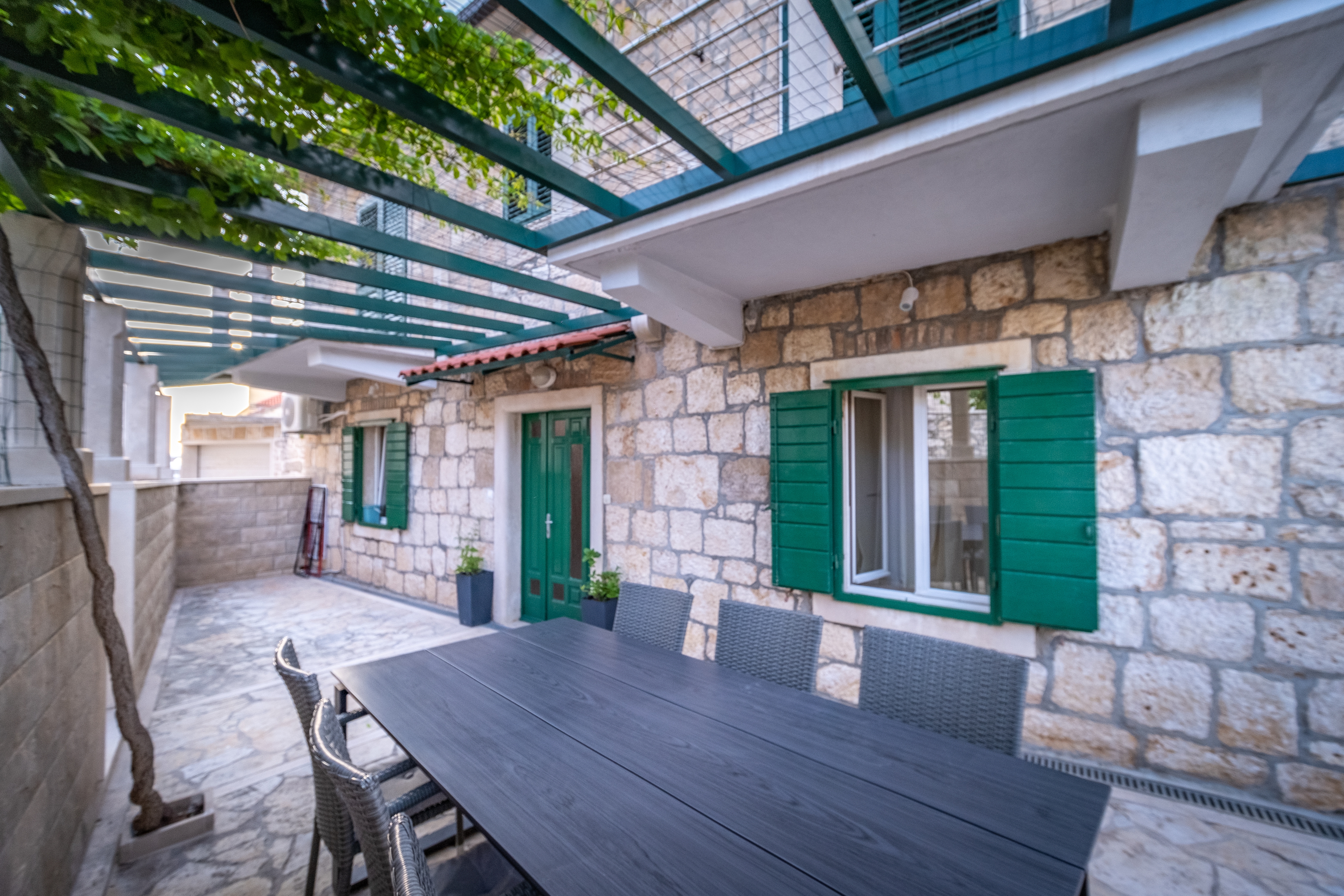 Two bedroom apartment near beach Postira, Brač  A-a