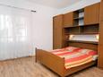 Supetarska Draga - Gornja, Bedroom in the apartment, (pet friendly) and WiFi.