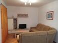 Obývacia izba Supetarska Draga - Gornja, Obývacia izba v ubytovacej jednotke apartment, klimatizácia k dispozícii, domáci miláčikovia povolení a WiFi.