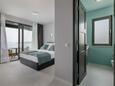 Bedroom 1 Makarska, Bedroom 1 in the apartment, air condition available and WiFi.