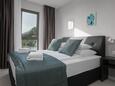 Bedroom 2 Makarska, Bedroom 2 in the apartment, air condition available and WiFi.
