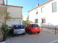 Seget Donji, Trogir, Parking lot 2029 - Apartments near sea with pebble beach.