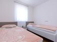Спальня 2 Vantačići, Спальня 2 в размещении типа apartment, доступный кондиционер и WiFi.