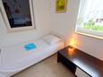 Спальня 1 Punat, Спальня 1 в размещении типа apartment, WiFi.