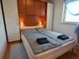 Спальня 1 Malinska, Спальня 1 в размещении типа apartment, WiFi.