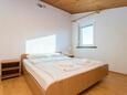 Ložnice 1 Njivice, Ložnice 1 v ubytování typu apartment, domácí mazlíčci povoleni a WiFi.