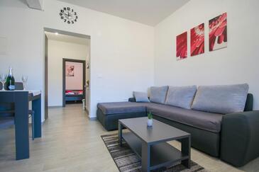 Porat, Living room in the apartment, air condition available and WiFi.