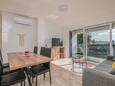 Malinska, Jídelna v ubytování typu apartment, s klimatizací a WiFi.