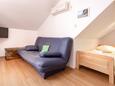 Zavala, Living room in the studio-apartment, air condition available and WiFi.