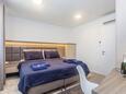 Спальня 2 Vantačići, Спальня 2 в размещении типа apartment, доступный кондиционер.