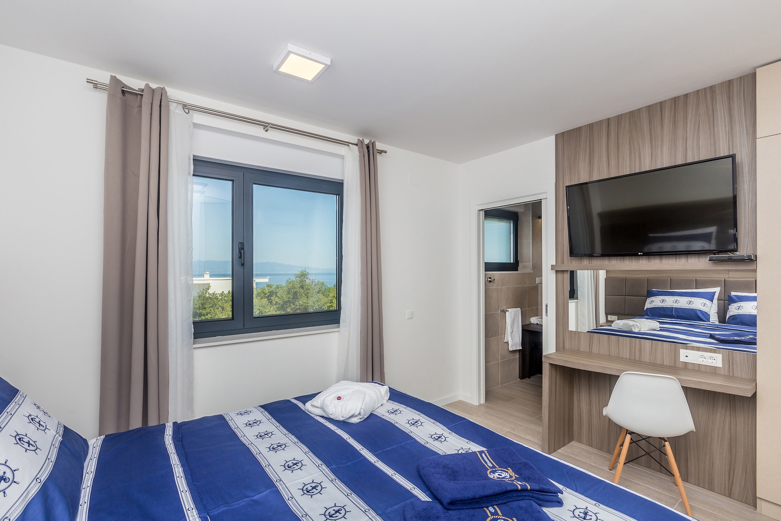 Two bedroom apartment with terrace and sea view Vantačići, Krk  A-b