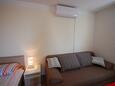 Sveti Vid, Гостиная в размещении типа studio-apartment, доступный кондиционер и WiFi.
