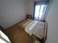 Спальня 1 Lopar, Спальня 1 в размещении типа apartment, доступный кондиционер, Домашние животные допускаются и WiFi.